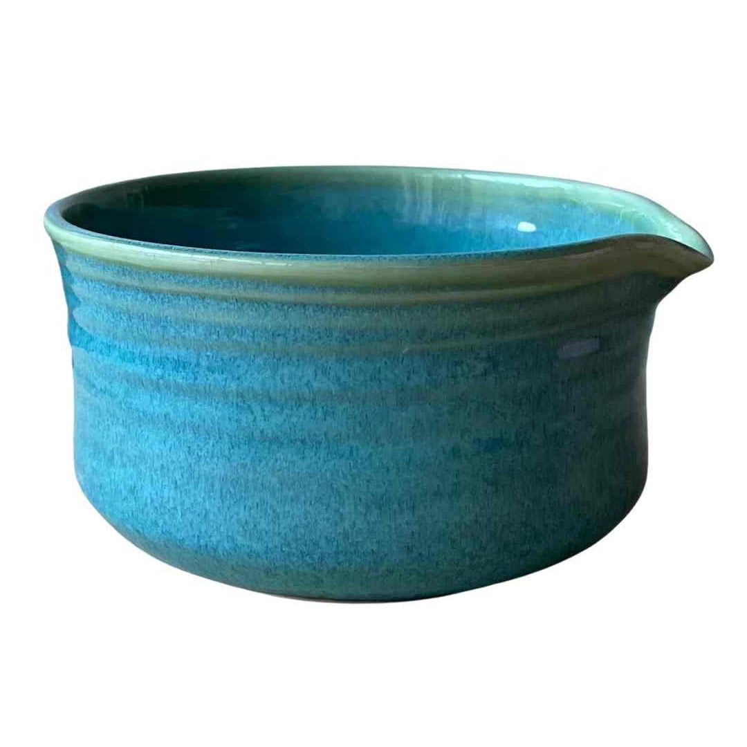 Green ceramic Matcha bowl  on a white background