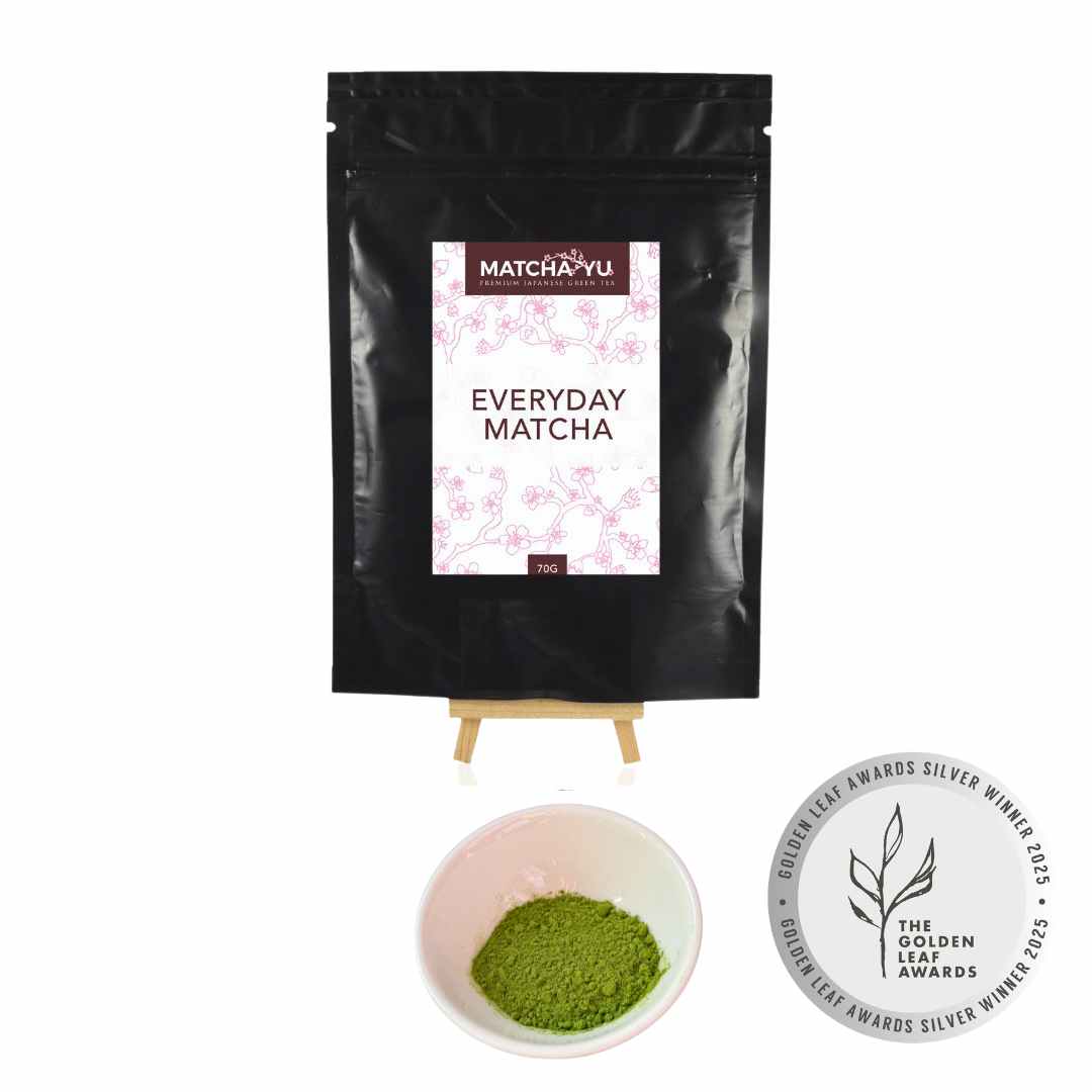 Matcha Yu Everyday Matcha packaging with a bowl of matcha powder on a white background