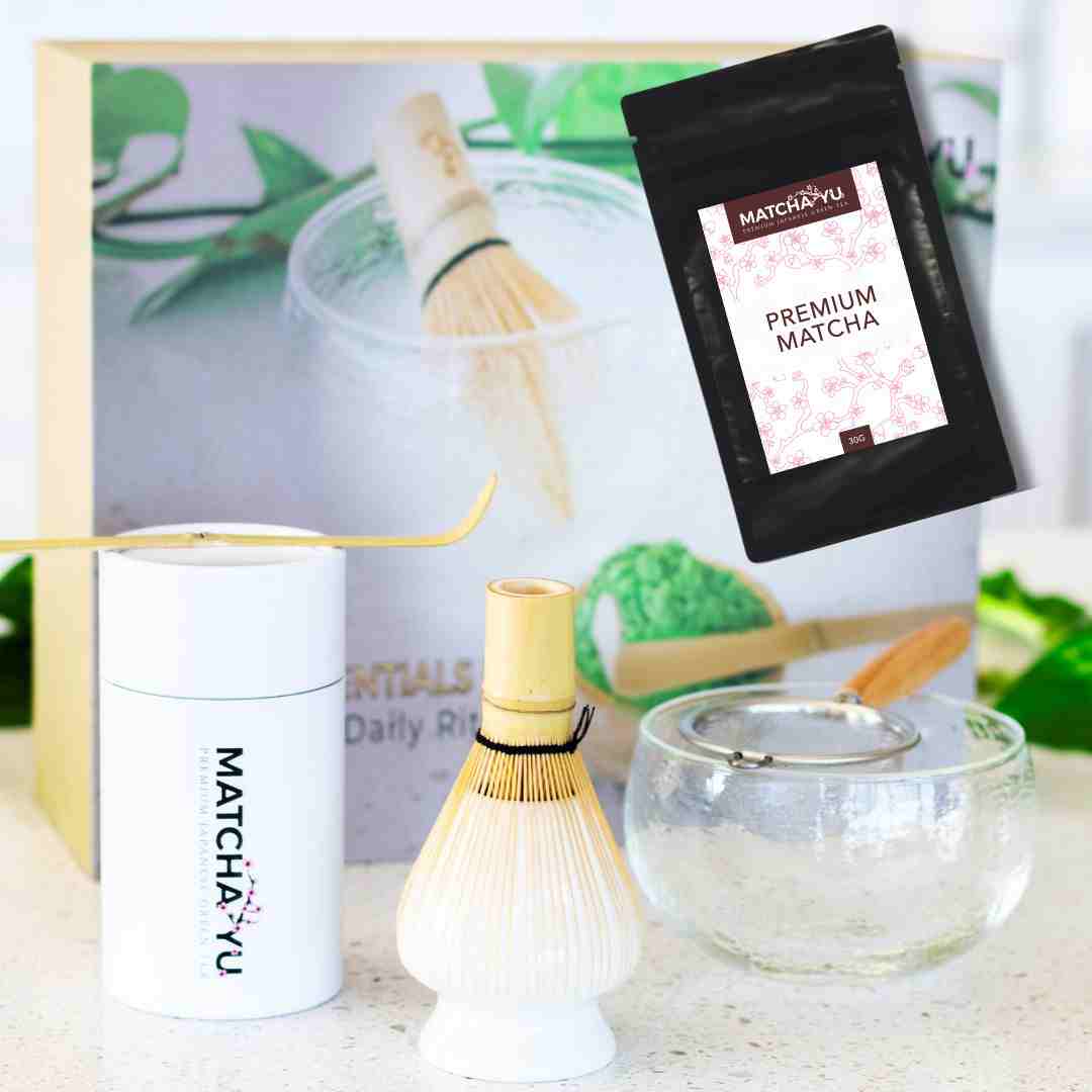 Matcha preparation set with Matcha-Yu packaging and tools on a light background